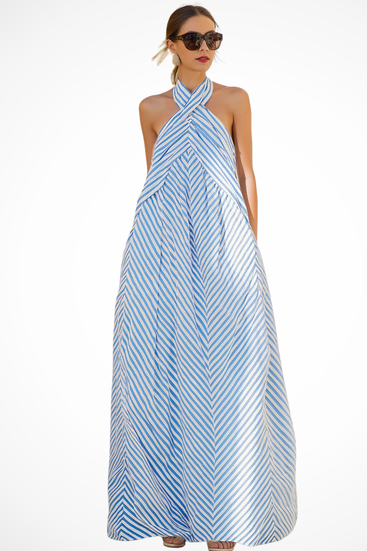 Sleeveless striped halter neck maxi sundress for women. Relaxed, flowing fit, great for warm weather.