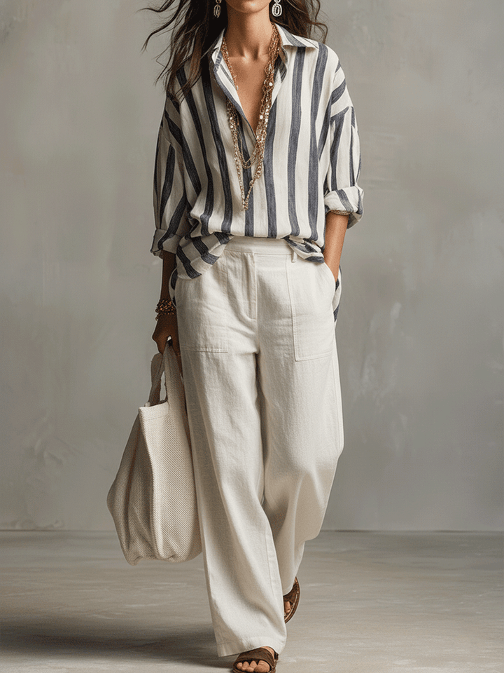 Comfortable women's striped long sleeve top, button-up, a stylish addition to any wardrobe.