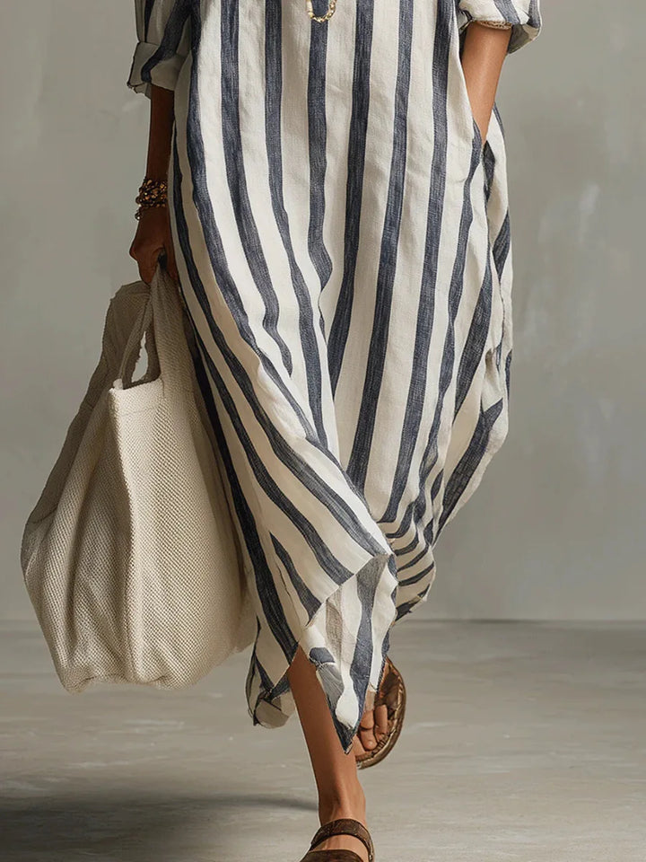 Lightweight striped maxi shirt dress for women, great for summer travel, featuring a relaxed fit & pockets.
