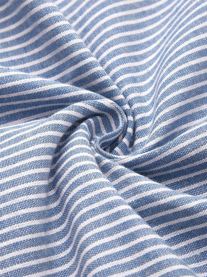 Classic striped midi dress for women, featuring elegant buttons and 3/4 sleeves, offering comfortable and chic style.