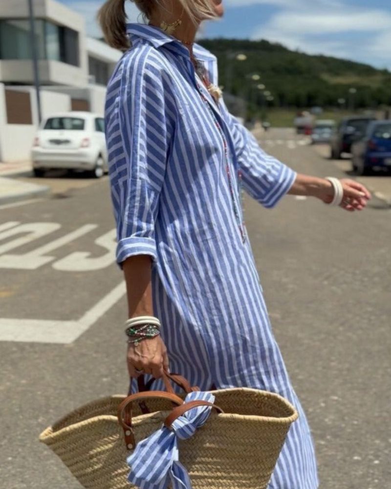 Modern classic women's striped button-down midi shirt dress, featuring practical pockets & elegant design.