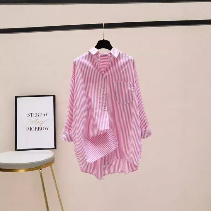 Chic women's striped oversized button-down shirt, perfect for casual or preppy multi-season wear.