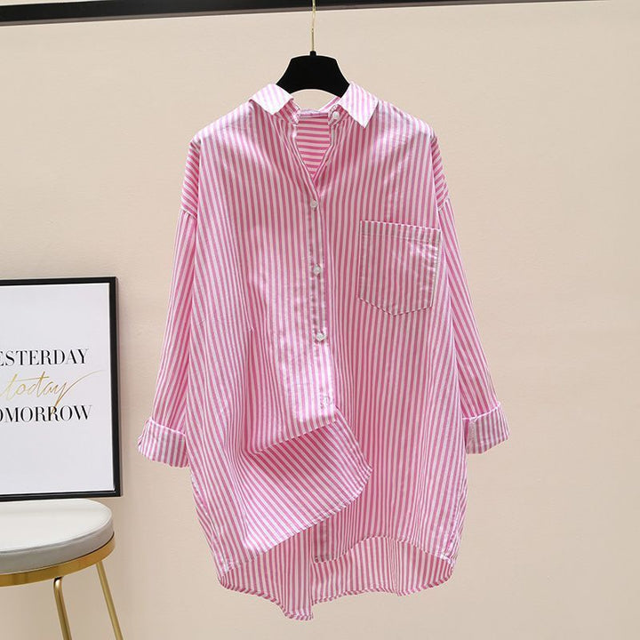Versatile women's striped oversized button-down shirt, a chic longline top for any casual occasion.