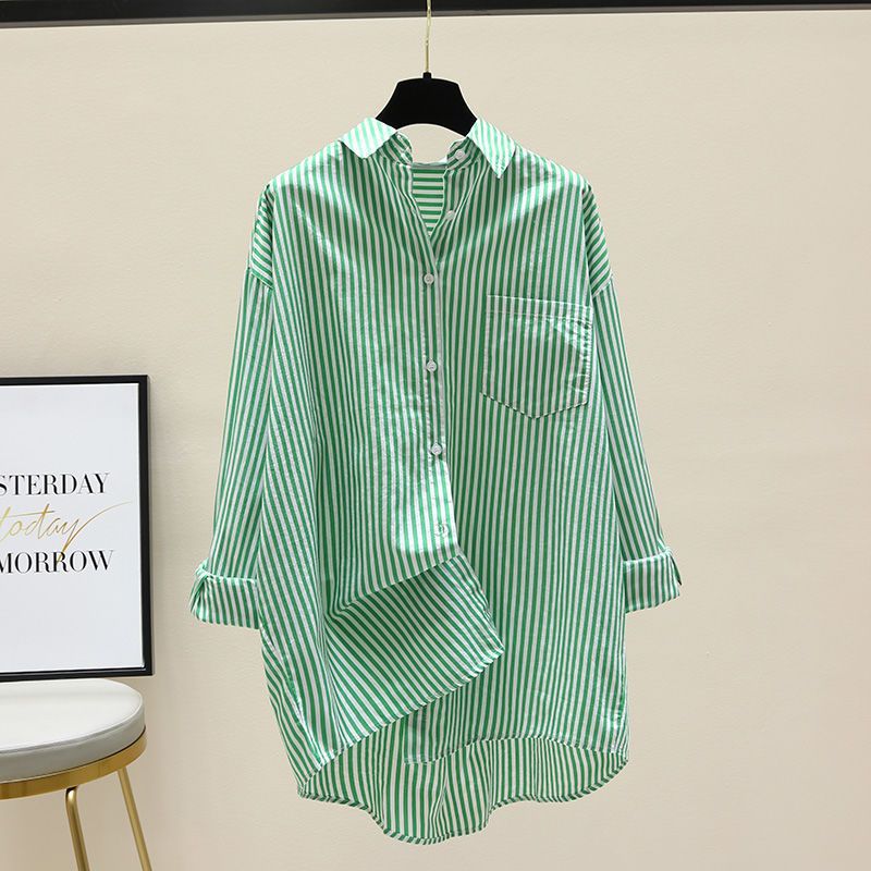 Preppy women's striped oversized longline button-down shirt, a stylish collared top for chic comfort.