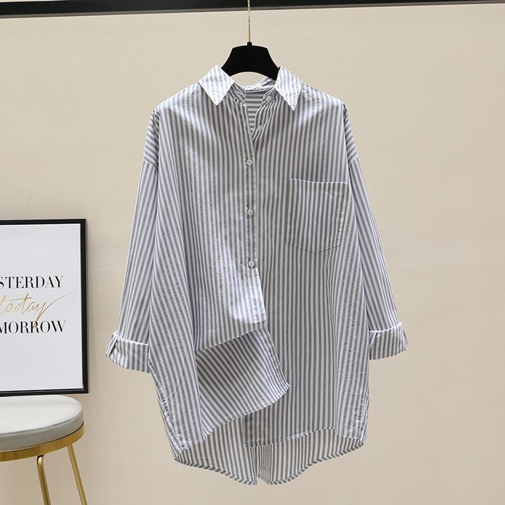 Relaxed fit women's striped longline button-down shirt, an oversized top for comfortable, chic style.