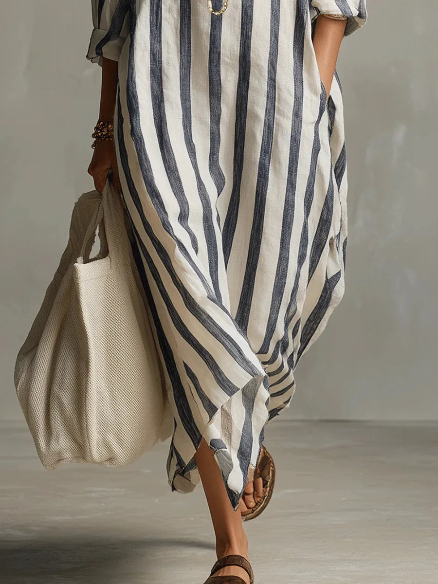 Stylish women's striped oversized maxi dress, modern design, casual everyday fashion.