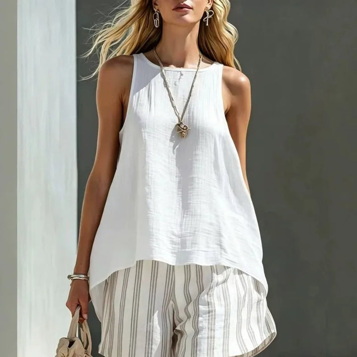 Sleeveless tank top & striped shorts women's summer outfit. Lightweight and breathable for warm weather comfort.