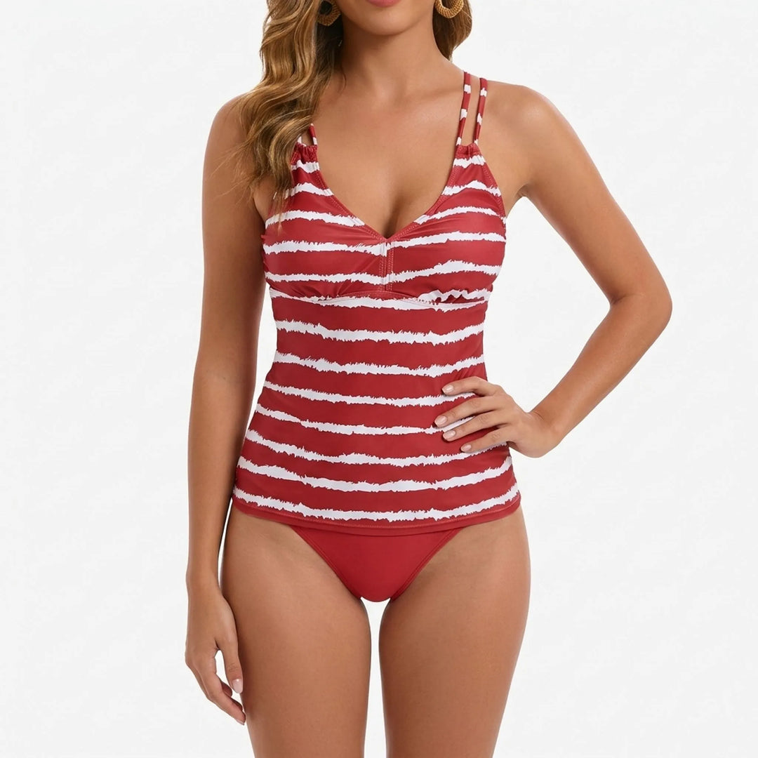 Women's two-piece striped tankini set, perfect beachwear or pool attire for a summer vacation outfit.