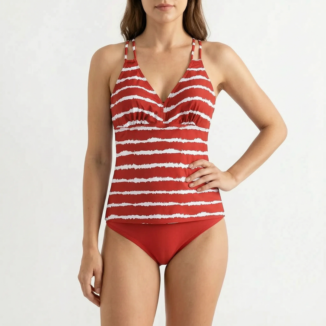 Elegant striped tankini top with matching low-rise bikini bottoms. Women's two-piece swimwear for a sophisticated beach look.