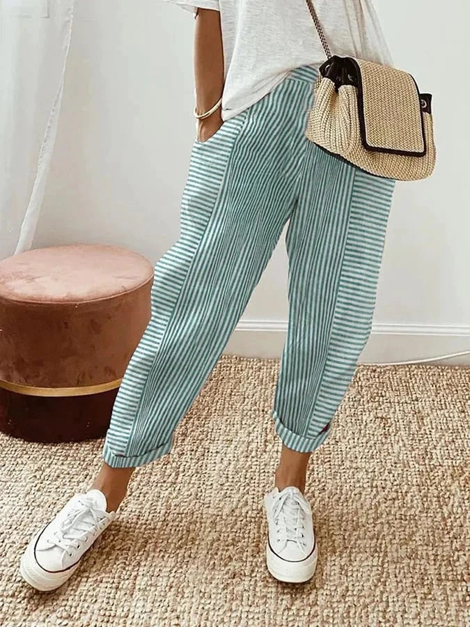Relaxed fit women's striped trousers with elastic waist, ideal for spring and summer casual everyday style.