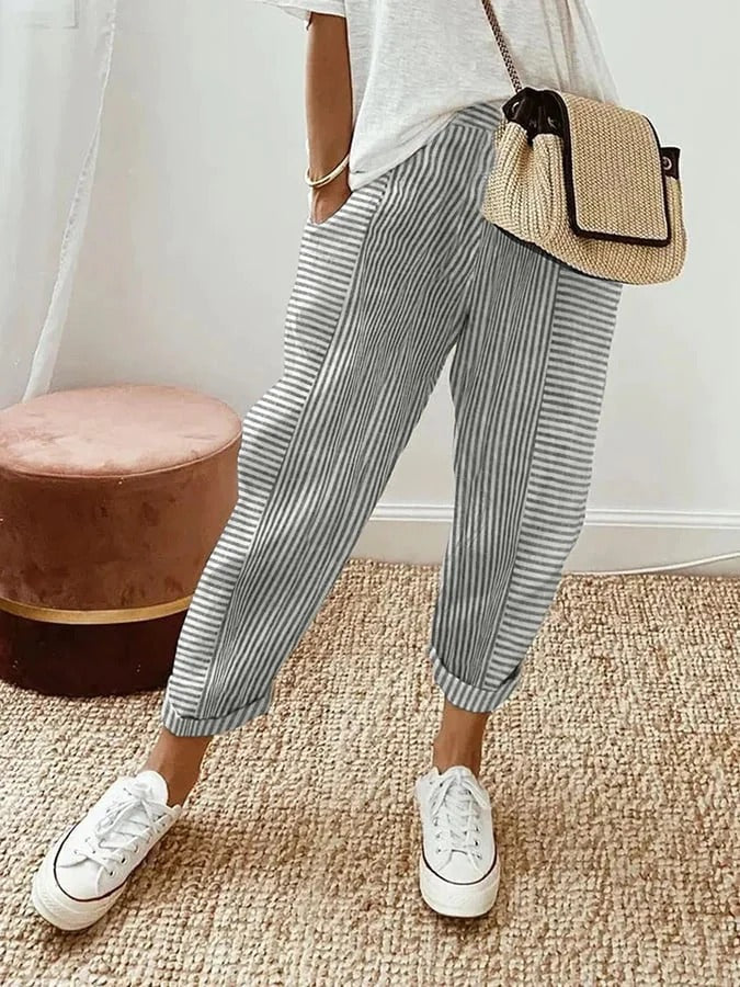 Casual women's striped trousers, relaxed fit, elastic waist, great for summer fashion and everyday comfort.