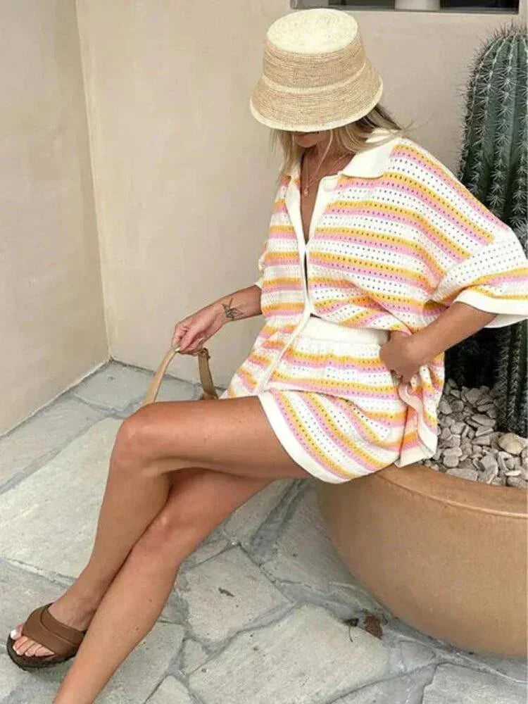 Matching women's striped short sleeve top and elastic waist shorts, a versatile lounge set.