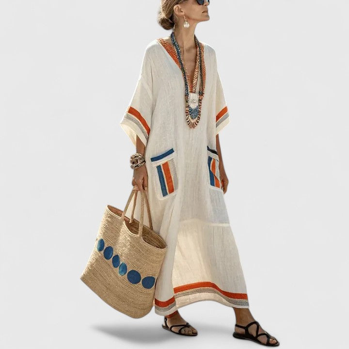 Versatile women's striped maxi dress with V-neck and pockets, great for beach, resort, or casual wear.