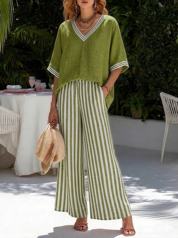 Elegant striped V-neck top paired with comfortable wide leg pants, a women's two-piece set for summer style.