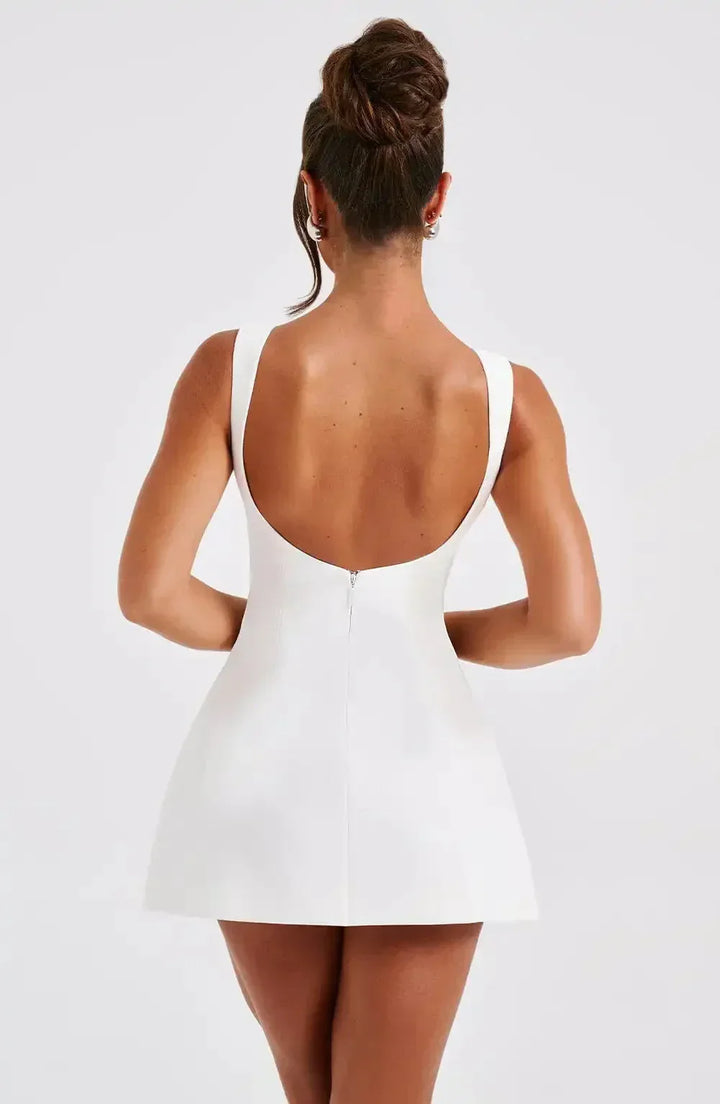 Elegant women's boat neck fit & flare mini dress. A chic, structured party or cocktail dress.