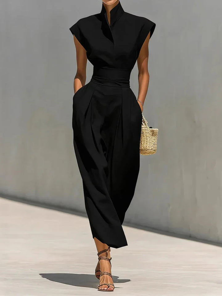 Elegant women's structured midi dress, featuring a flattering cinched waist, ideal for office wear in sophisticated grey.