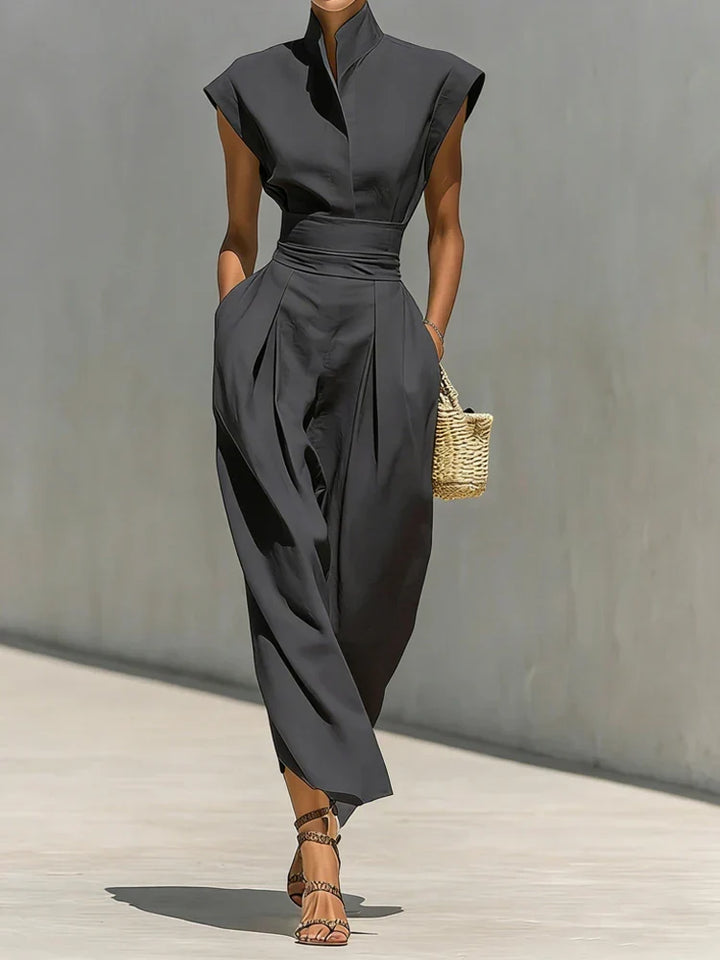 Chic burgundy structured midi dress for women, designed with a cinched waist, suitable for cocktail parties or work.