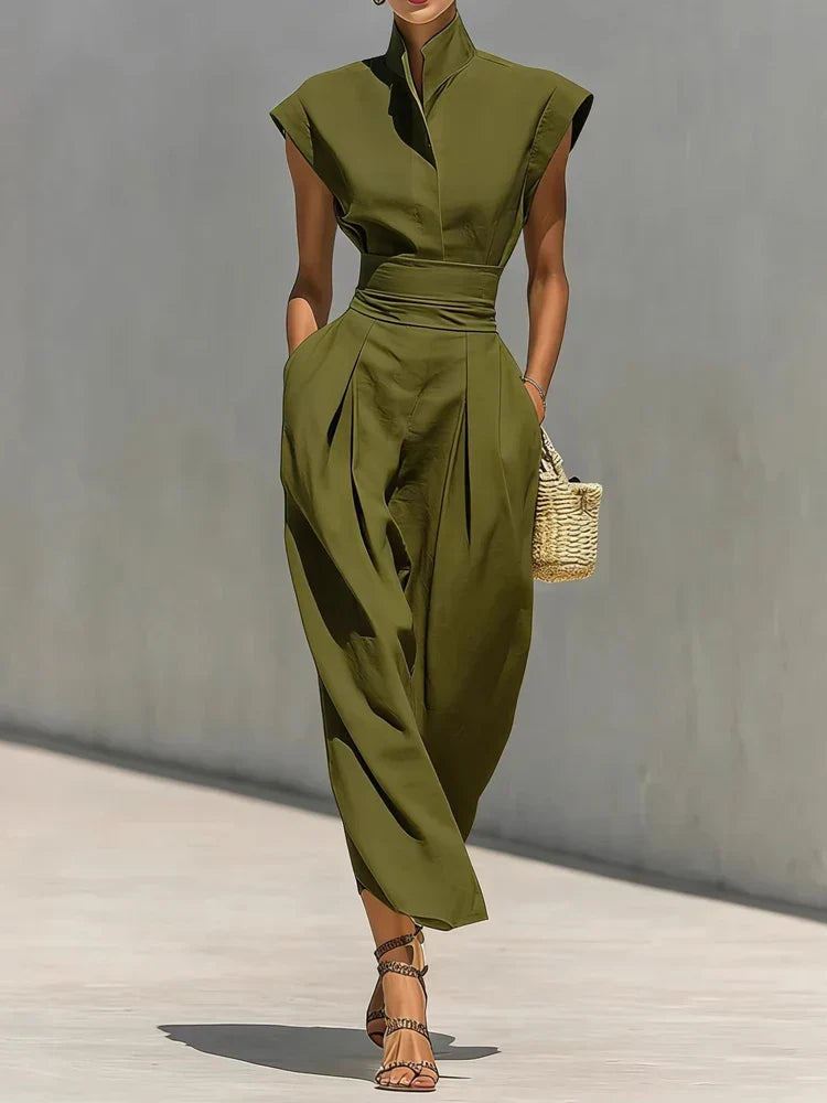 Stylish green structured midi dress for women with a flattering cinched waist, a versatile choice for office or events.