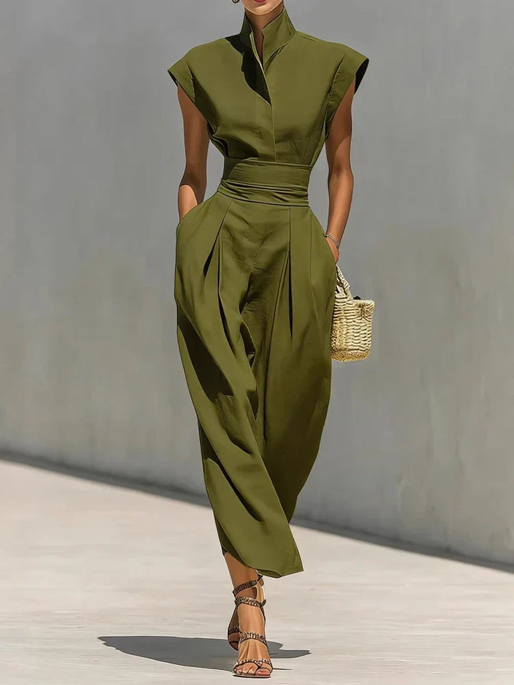 Stylish green structured midi dress for women with a flattering cinched waist, a versatile choice for office or events.