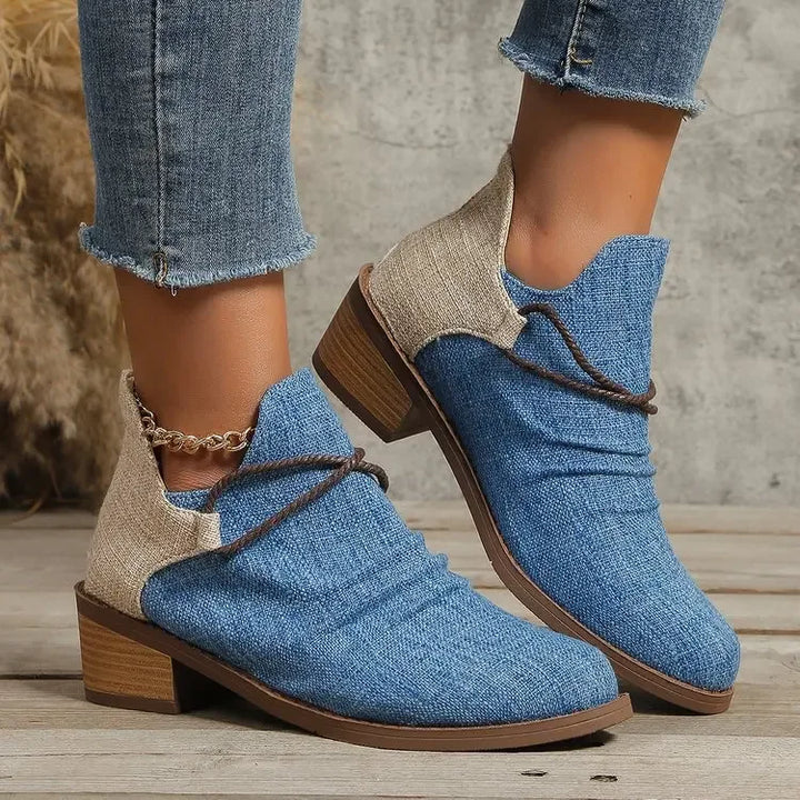 Comfortable women's ankle boots, denim blue, with stylish braided design. Everyday fashion footwear.