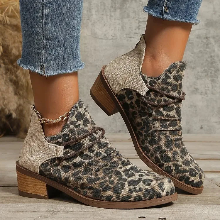 Fashion-forward women's ankle boots, leopard print, with braided & lace-wrap detail. Block heel.