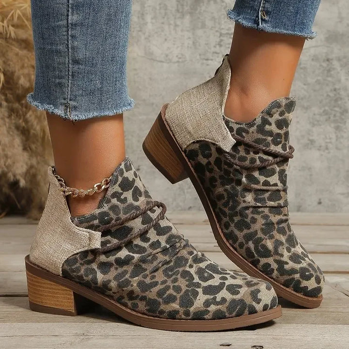 Fashion-forward women's ankle boots, leopard print, with braided & lace-wrap detail. Block heel.