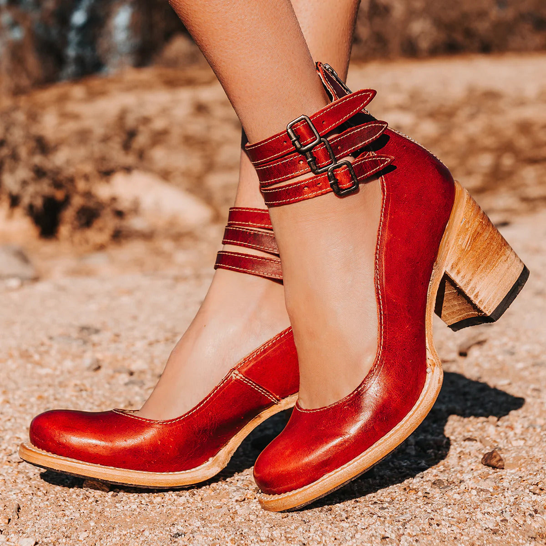 Classic women's fashion pumps, featuring a sturdy block heel, round toe, and elegant ankle strap.