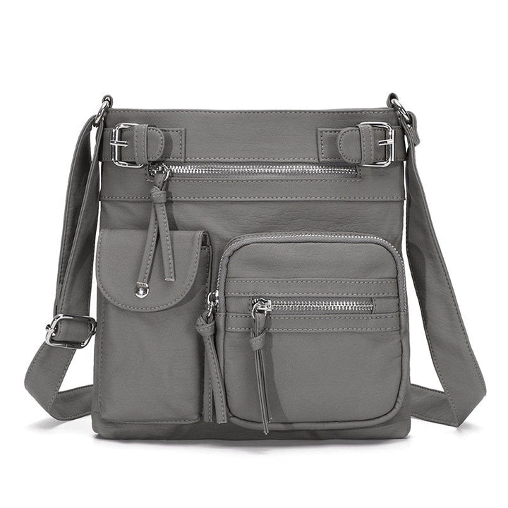 Ergonomic women's anti-theft bag, worn comfortably as a crossbody for hands-free security.