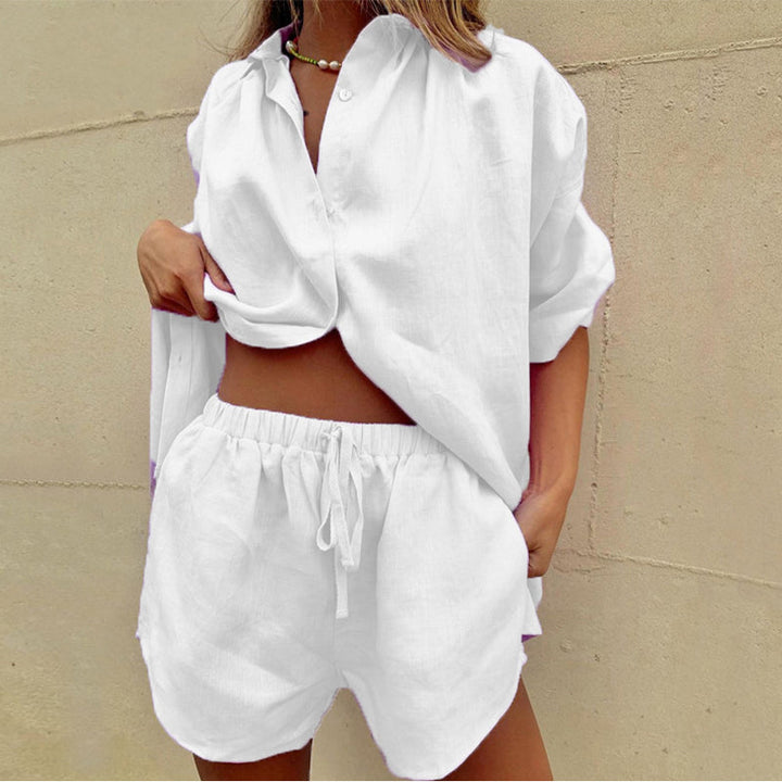 Trendy women's cotton shorts set with a matching button-down top, ideal for comfortable summer fashion.
