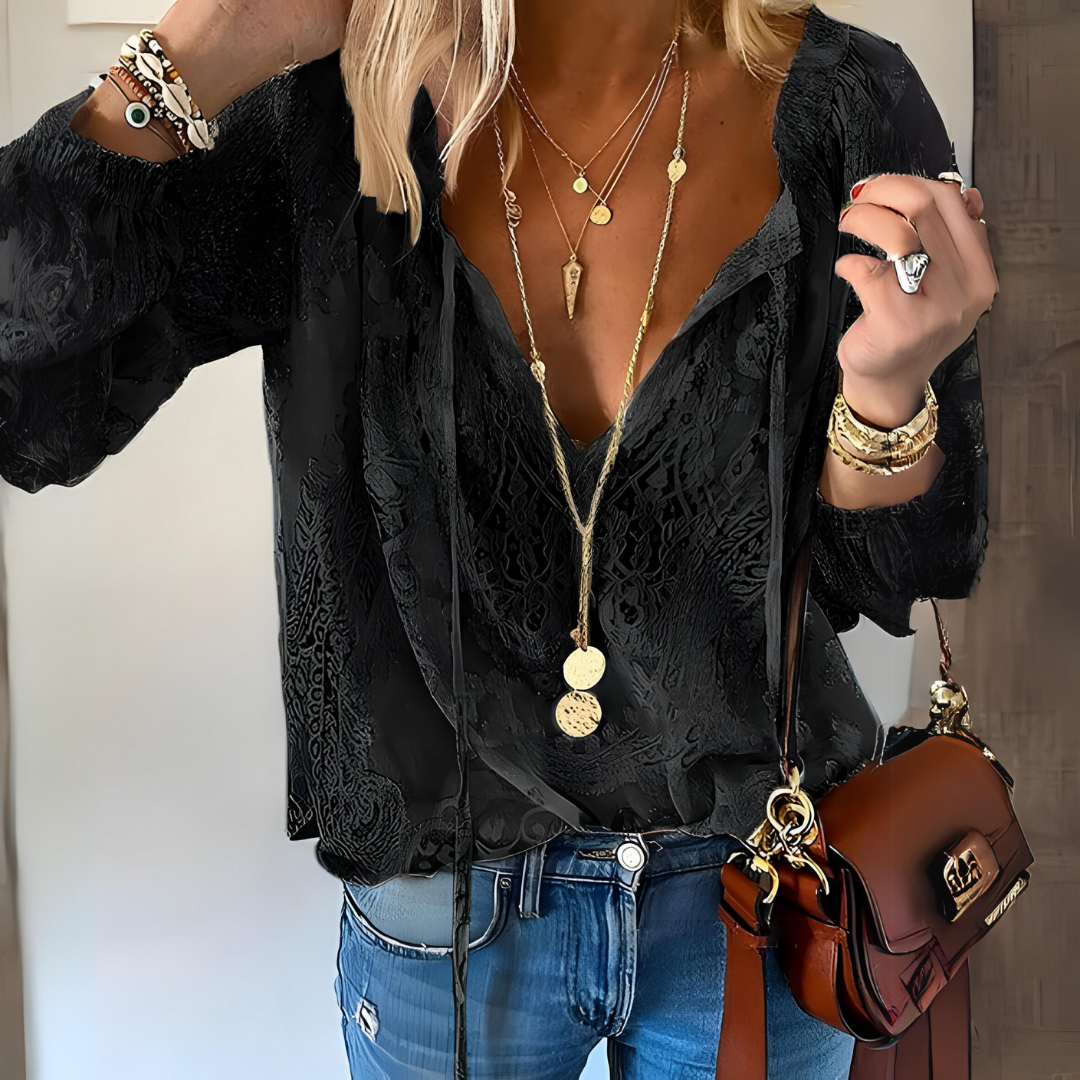 Elegant women's bohemian style crocheted blouse, loose fit long sleeve top. Ideal for summer fashion & beach wear.
