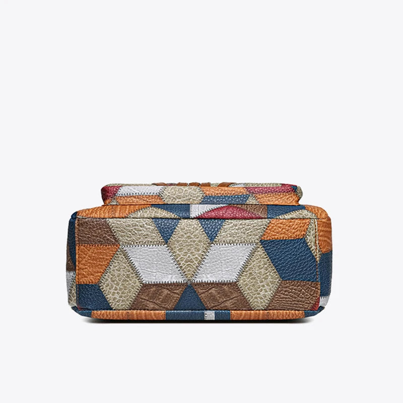 Versatile geometric patchwork shoulder bag for women. Vegan leather fashion purse.