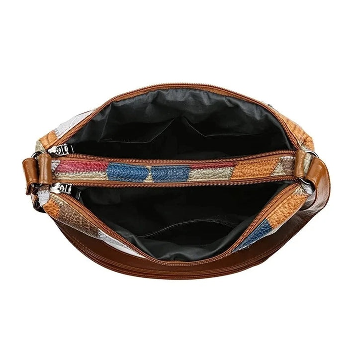 Everyday women's stylish geometric patchwork handbag. Durable vegan leather accessory.