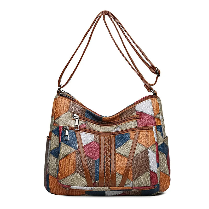 Elegant women's geometric patchwork handbag. Vegan leather fashion accessory.