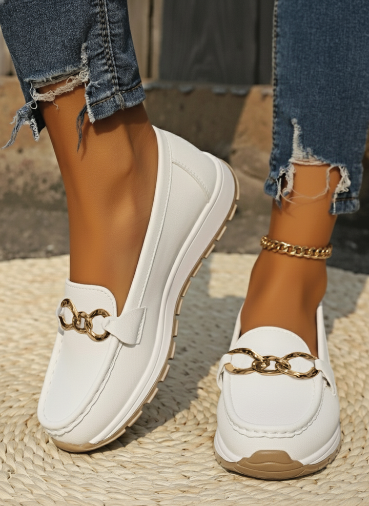 White women's comfortable flat buckle loafers. Stylish slip-on shoes for casual, office & everyday wear.