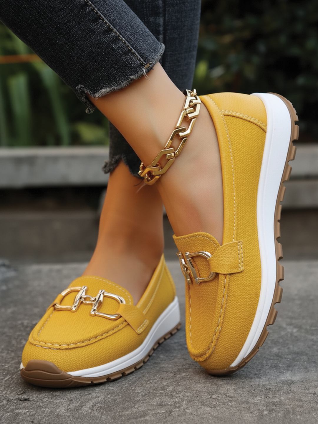 Women's stylish slip-on flat loafers with elegant buckle. Perfect comfortable casual footwear for all day.