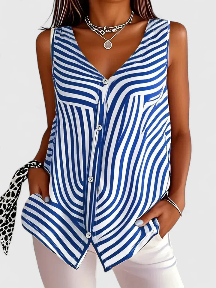 Stylish women's loose fit blouse, offering everyday elegance & comfort. Ideal spring/summer top for women.