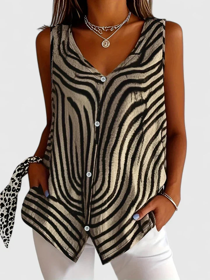 Elegant women's casual blouse, loose fitting for maximum comfort. A versatile everyday top for spring/summer.