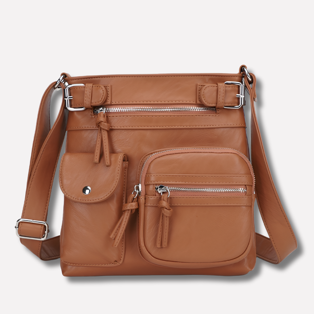 Grey compact women's crossbody bag with multi-pocket organization, ideal fashion accessory.