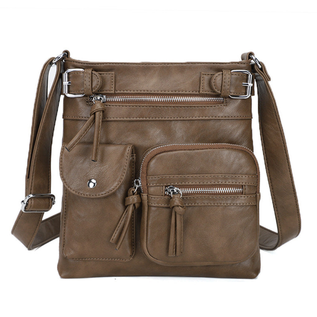 Stylish women's everyday bag in light brown, multi-pocket crossbody for convenient organization.