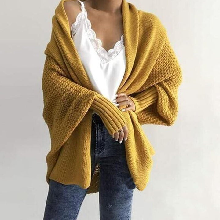 Women's comfortable long sleeve oversized cardigan, an essential for cozy & elegant fashion.