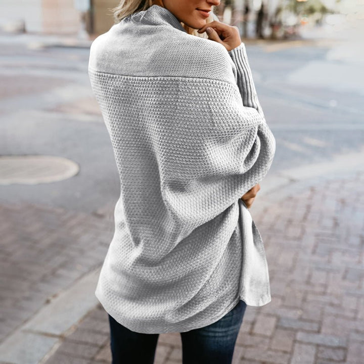 Versatile oversized cardigan for women, an essential piece for elegant layering & warmth.