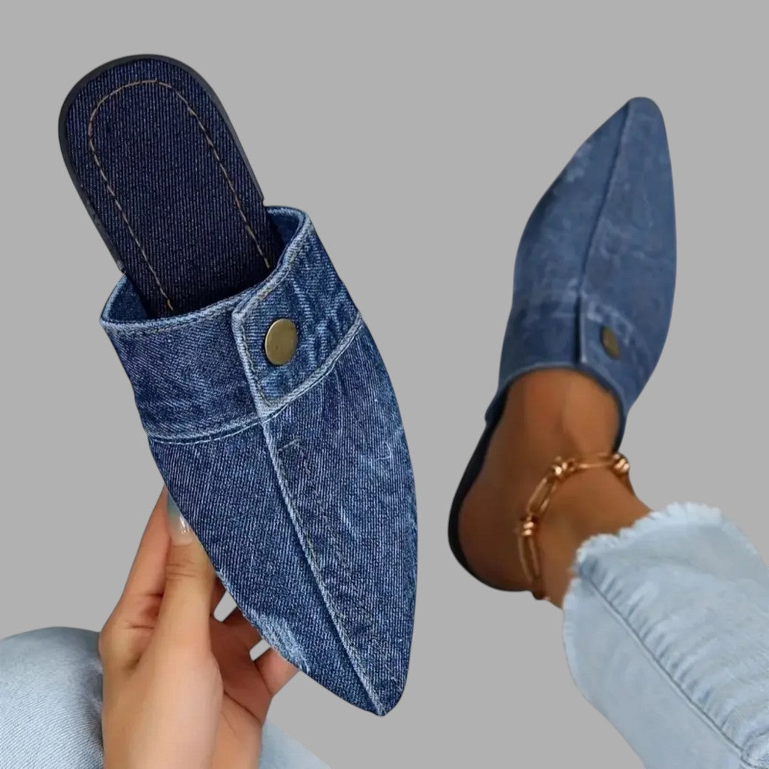 Comfortable women's slip-on mule sandals with a soft strap, ideal for casual summer style and easy wear.