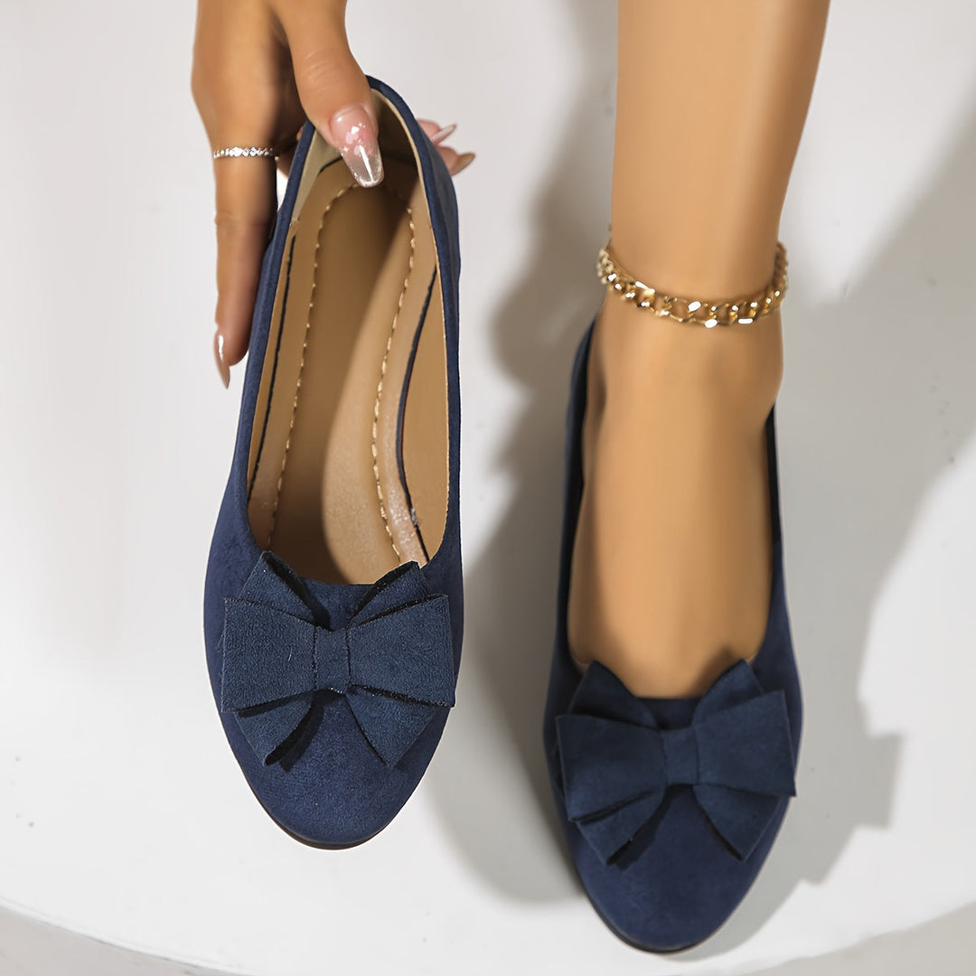 Modern women's wedge footwear, easy slip-on design for comfortable and stylish elegance.