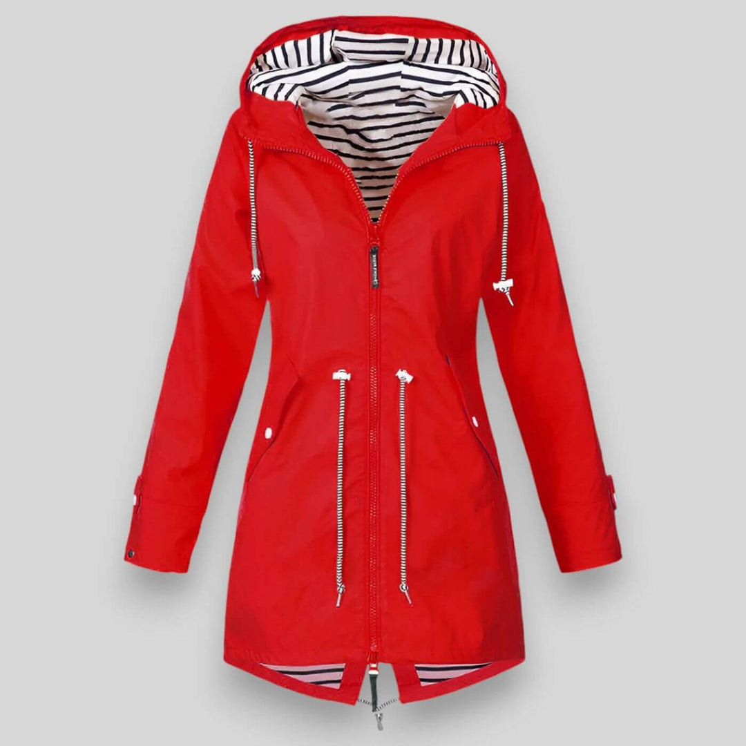 Stylish women's hooded rain jacket, providing waterproof all-weather protection & comfort.