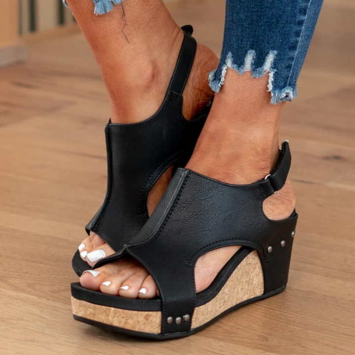 Women's elegant wedge heel sandals, perfect for adding a stylish touch to summer outfits.
