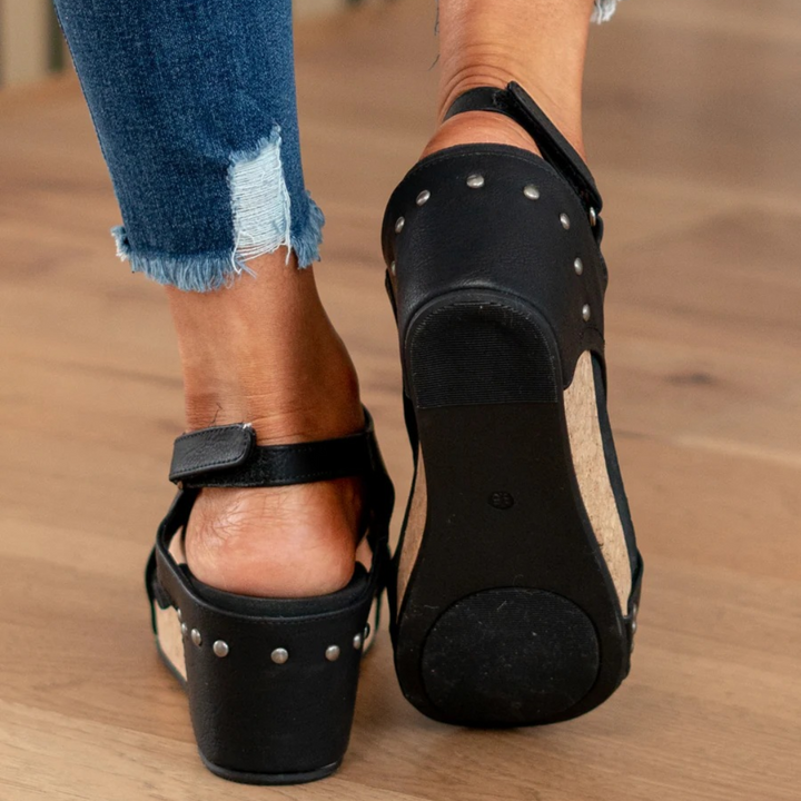 Fashionable women's wedge sandals, providing both style and comfort for summer occasions.