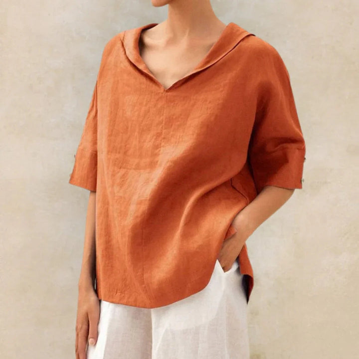 Comfortable ladies summer top with button-front closure & adjustable roll-up sleeves. Ideal relaxed fit for daily wear.