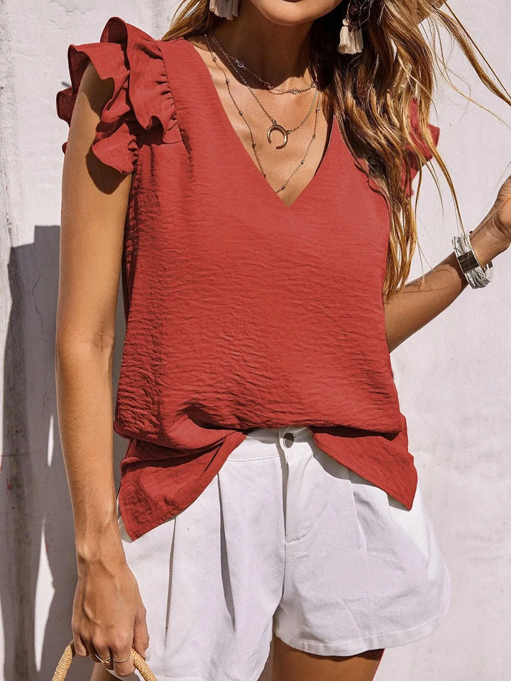 Chic women's V-neck summer blouse featuring elegant ruffle sleeves. Lightweight, perfect for casual & vacation wear.