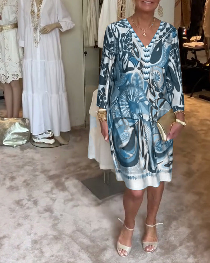 Vibrant sunburst print women's casual tunic dress, a comfortable boho summer outfit choice.