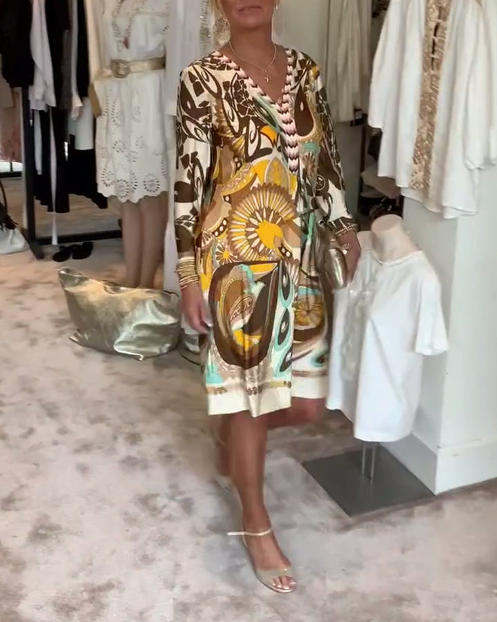 Casual summer sunburst print tunic dress, ideal for vacation, resort wear & comfort.
